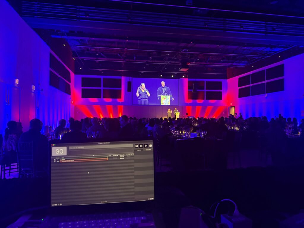 Full gala production with live camera projection screens